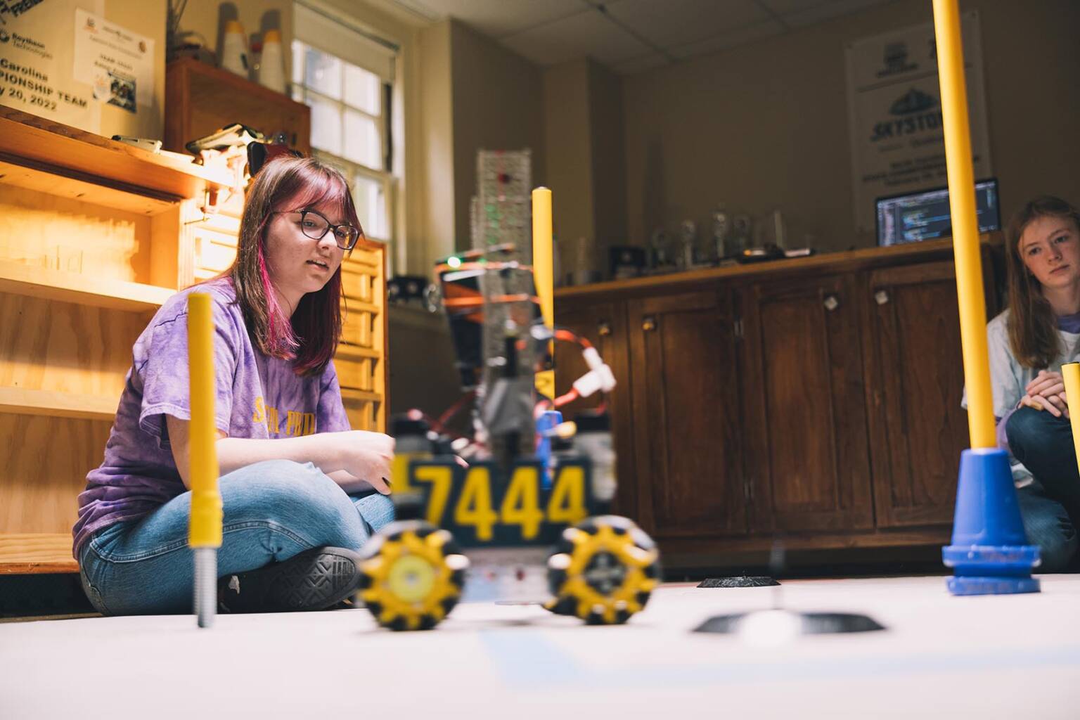 students working on project on the floor
